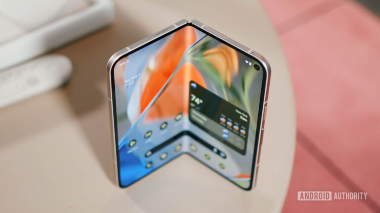 Google Pixel 9 Pro Fold Open On A Table At A 90 Degree Angle Showing The Inner Home Screen.jpg