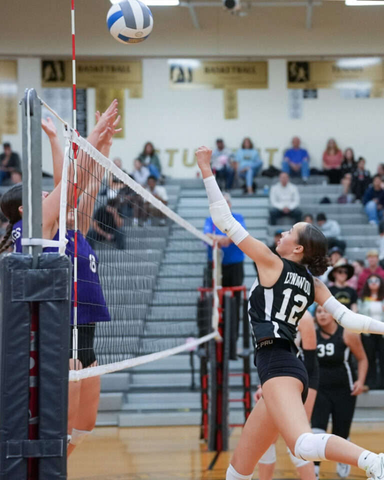 1 Lynnwood Junior Jayden Lorenz Punches The Ball Over The Lake Stevens Defenders.jpg